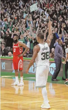  ?? STAFF FILE PHOTO BY MATT STONE ?? RECHARGED: The Celtics’ 26-point comeback on the Rockets on Dec. 28, capped by Marcus Smart (right) drawing a pair of charges on James Harden (left), remains one of the highlights of the season. The teams meet again in Houston tonight.