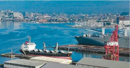  ?? JERRY JACKSON/STAFF ?? Balsa 94, left, a general cargo ship, and MV Gary I. Gordon, a military sealift roll-on/roll-off ship, are tied up at Pier 1 in Canton Industrial Area. They are among the ships confined to the port because of the Francis Scott Key Bridge debris.