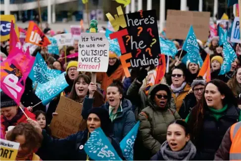  ?? (PA) ?? Protesters including members of the NEU gather at a rally in Birmingham on Wednesday