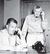  ?? COURTESY OF MANHATTAN PROJECT ?? Maj. Gen. Leslie R. Groves, left, director of the Manhattan Project, at work with Brig. Gen. Thomas F. Farrell, the project’s deputy director.