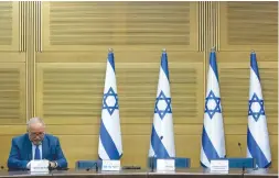  ?? (Yonatan Sindel/Flash90) ?? FINANCE MINISTER Avigdor Liberman awaits the start of a cabinet meeting at the Knesset last month.