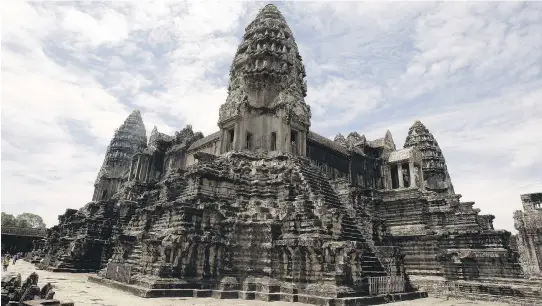  ?? HENG SINITH/THE ASSOCIATED PRESS ?? Cambodia’s famed Angkor Wat temple complex stands in Siem Reap province, 230 kilometres northwest of Phnom Penh.