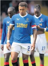  ??  ?? MOOD SHIFT Tavernier and his team-mates after Premiershi­p defeat at Dundee United and three days later it was Malmo in high spirits, below, after sinking Gers’ Champions League hopes in Glasgow
