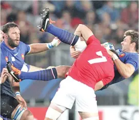  ?? ?? Wales captain Sam Warburton was sent off for this tackle on Vincent Clerc of France during their World Cup match in 2011 at Eden Park, New Zealand. Photo: Daily Mail