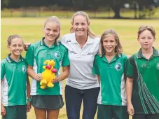  ??  ?? Olympic kayaker Alyce Burnett with Elanora State School students Luna Piazza, Louisa Oberhofer, Jackson Coles and Joel Birchyard.