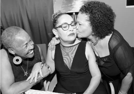  ?? RUDOLPH BROWN ?? Berl Francis (left) and Maxine Brown (right) greet Hilary Wehby at the launch of Wehby’s book ‘My New Normal: Reflection­s of a Stroke Survivor’ earlier this year.