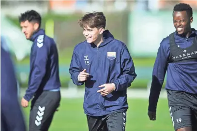  ?? CAITIE MCMEKIN/NEWS SENTINEL ?? Leo Santos smiles on the field at a One Knoxville SC practice at Emerald Youth soccer fields on March 12.