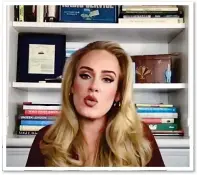  ?? ?? BOOKED UP: Adele in front of her bookshelve­s during a Zoom interview