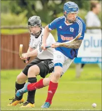  ?? Photograph: Neil Paterson. ?? Kyles Athletic’s Roddy Macdonald gets away from Lovat’s Callum Cruden.