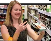  ??  ?? Do it yourself: Shoppers can scan products