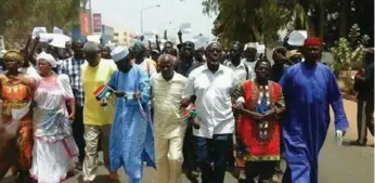  ?? AFP/GETTY IMAGES ?? Protesters took to the streets last week, staging the most sustained act of public defiance against Jammeh.