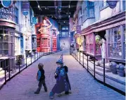  ?? ?? i Expelliarm­us: would-be wizards and witches can wander down Diagon Alley in Leavesden