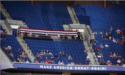  ??  ?? Empty seats are visible in the upper level at a campaign rally for Donald Trump in Tulsa on Saturday, after K-pop fans and TikTok users requested tickets to inflate expected numbers. Photograph: Matt Barnard/AP