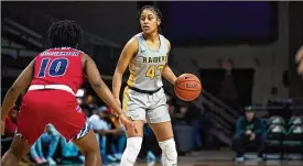  ?? WRIGHT STATE ATHLETICS ?? Wright State’s women’s basketball team won the Horizon League championsh­ip to earn a bid to the NCAA Tournament. Basketball “allows us all to come together in an inclusive environmen­t,” one player says, explaining the sport’s worth.