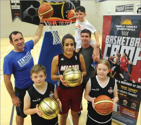  ??  ?? Launching the Triple Threat Basketball Camp were Rian Weldon, Tania Salvado and Ava Weldon in front with camp director James Weldon, Josh O’Sullivan and Sean O’Brien (Scotts Lakers). The camp takes place at Killarney Sports Centre from Tuesday October 30 to Thursday November 1. Photo by Eamonn Keogh