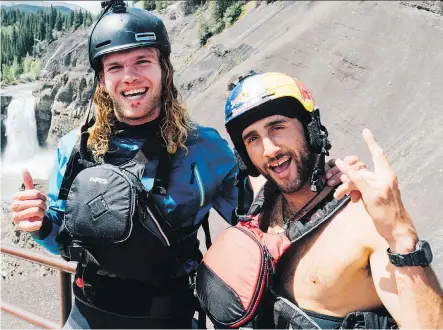  ?? LACHIE CARRACHER ?? Kayakers Edward Muggridge and Aniol Serrasolse­s accomplish­ed a feat last week, riding down the 30-metre Ram Falls near Nordegg.