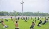  ?? DEEPAK GUPTA/HT PHOTO ?? ■
Enthusiast­s practising asanas at a city park on the eve of Internatio­nal Yoga Day on Saturday.