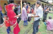  ?? REUTERS FILE ?? Villagers at the NRC centre in Assam’s Morigaon.