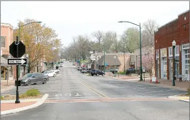  ??  ?? Downtown Siloam Springs has felt the effects of the coronaviru­s. Many businesses have closed their doors to the public in order to help prevent the spread of the disease.
(NWA Democrat-Gazette/Janelle Jessen)