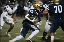  ?? PHOTO BY NICK KOON ?? Malachi Sales picks up yardage for Vista Murrieta, which improved to 6-1following last week’s 31-24victory over Chaparral.