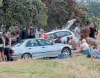  ?? ?? Waikato’s emergency department doctor John Bonning, pictured left, said Crate Day was frustratin­g. Right: Crate Day havoc at Manly Beach, North Auckland in 2014.