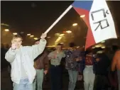  ??  ?? People in Prague celebrate the foundation of the Czech Republic on 1 January 1993, following the dissolutio­n of Czechoslov­akia