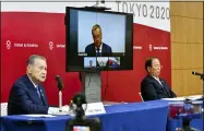  ?? KAZUHIRO NOGI — POOL PHOTO VIA AP ?? Tokyo 2020Organi­zing Committee President Yoshiro Mori, left, and CEO Toshiro Muto, right, attend a teleconfer­ence with Internatio­nal Olympic Committee member John Coates, who heads the inspection team for Tokyo Olympics on April 16 in Tokyo.