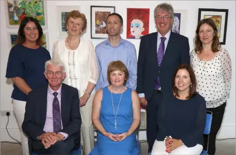  ??  ?? Back: Anne Marie Laffan (community department), Cllr. Kathleen Codd-Nolan, Michael Sweeney (community department), John Carley 9director of services) and Liz Hore (area manager). Front: Tom Dowling (judge), Cllr. Barbara Ann Murphy and Alison Dowling (judge) at the Pride of Place in the Art Bank, Bunclody.