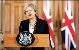  ?? JACK TAYLOR/GETTY-AFP ?? British Prime Minister Theresa May addresses Brexit negotiatio­ns Friday in London.