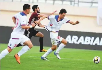  ?? Courtesy: IPL ?? Action from the match between Sharjah and Al Wahda during the 20th round of the Arabian Gulf League yesterday. Al Wahda won 3-2.