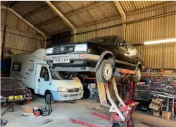  ?? ?? 1
We’re lucky to have this mobile lift in the Classics World workshop, so after loosening the wheel bolts we got the Jetta up in the air to better see what we’ve got.