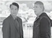  ?? CURTIS BONDS BAKER/NETFLIX ?? Ralph Macchio, left, and William Zabka in“Cobra Kai.”Netflix picked up the YouTube Premium series last year.