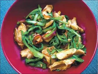  ?? COURTESY OF STACIE DONG ?? Velveting, a blanching technique, turns this soy, balsamic and Sriracha chicken stir-fry into something special.