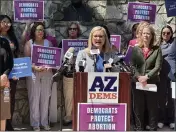  ?? JONATHAN COPPER — THE ASSOCIATED PRESS ?? Phoenix Mayor Kate Gallego speaks to reporters at the state Capitol in Phoenix on April 9. The near-total abortion ban resurrecte­d last week by the Arizona Supreme Court dates to 1864, a time when gold-seekers were moving, white settlers were clashing with Native Americans and dueling had to be regulated.