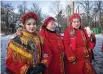  ?? (AP photo/ Efrem Lukatsky) ?? Women dressed in national suits celebrate Christmas Monday in the village of Pirogovo outside capital Kyiv, Ukraine.