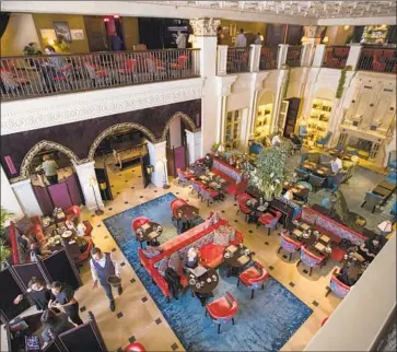  ?? Allen J. Schaben Los Angeles Times ?? THE LEISURE and hospitalit­y sector led California’s employment growth in November with 12,400 positions added since October. Above is a view of the Lobby restaurant at the NoMad boutique hotel in Los Angeles.