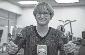  ?? GALINDO/THE COLUMBUS DISPATCH NICOLAS ?? Peggy O’connor uses an elliptical machine as part of her Exercise is Medicine regimen at the Ohio State Health and Fitness Center New Albany.