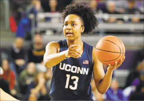  ?? Karl B DeBlaker / Associated Press ?? UConn’s Christyn Williams (13) runs a play against East Carolina during the second half during a game in January.