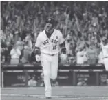  ?? David J. Phillip, The Associated Press ?? Gurriel celebrates while running the bases to complete his three-run blast Sunday.