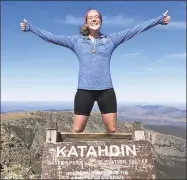  ?? Contribute­d photo ?? Diana Jackson, 23, of Darien, finishes her Appalachia­n Trail adventure on the peak of Mt Katahdin.