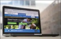  ?? AP PHOTO/ANDREW HARNIK ?? The HealthCare.gov website, where people can buy health insurance, is displayed on a laptop screen in Washington. Something new is happening in a health care debate dominated for seven years by the twists and turns of Barack Obama’s signature law. The...