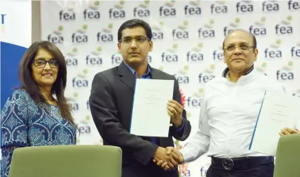  ?? Photo: JONE LUVENITOGA. ?? From Left: Unit Trust of Fiji chairperso­n, Shaenaz Voss, Unit Trust of chief executive, Vilash Chand with Fiji Electricit­y Authority chief executive, Hasmukh Patel at the Memorandum of Agreement at FEA Boardroom in Suva yesterday.