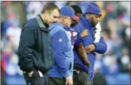  ?? RICH BARNES — THE ASSOCIATED PRESS FILE ?? In this Sunday file photo, Buffalo Bills trainers assists cornerback Tre’Davious White (27) off the field after being injured on a late hit by New England Patriots tight end Rob Gronkowski during the second half of an NFL football game, Sunday in...