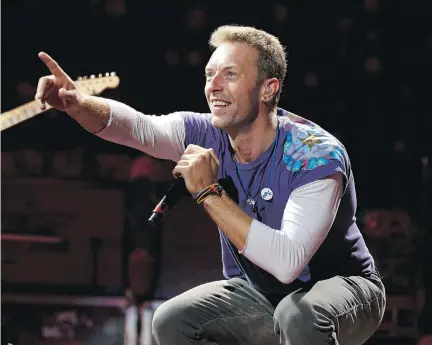  ?? IAN KUCERAK ?? Singer Chris Martin and his band Coldplay have been keeping fans happy for 20 years.