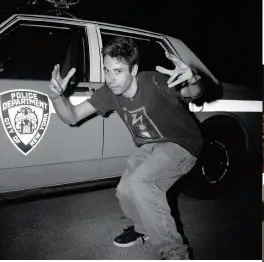  ?? ?? MCA FOREVER
Kwon took this photo of Adam Yauch after a release party for Beastie Boys’ Check Your Head at New York’s Pier 25. “As we were slowly exiting, Adam randomly just posted up like that in front of the cop car,” she says. “I love the energy of this image, Adam’s hands are like sculptures, and they frame his playful grin.”