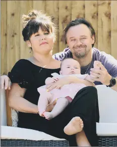  ?? Picture: Sarah Standing ?? HAPPY Cheryl and Matt with baby Harley