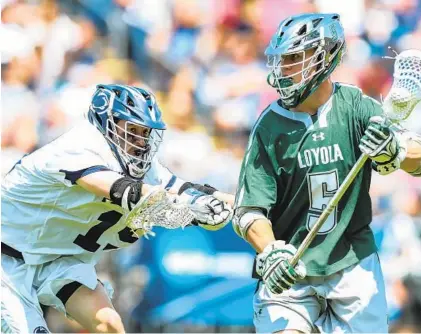  ?? JOHN MCCREARY/LOYOLA MARYLAND ATHLETICS ?? Loyola Maryland’s John Duffy scored two goals in the NCAA quarterfin­al, but Penn State powered to a 21-14 victory on Sunday.