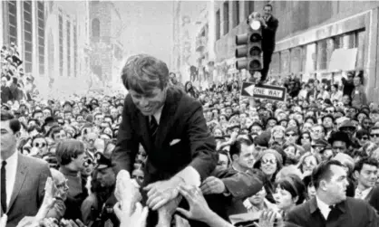  ?? Photograph: Warren Winterbott­om/AP ?? On the campaign trail in 1968, Bobby Kennedy made a definitive speech on the shortcomin­gs of economic growth as a measure.