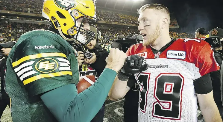  ?? AL CHAREST/FILES ?? Edmonton quarterbac­k Mike Reilly chats with his Calgary counterpar­t Bo Levi Mitchell after the 2015 West final, which the Esks won. The two meet in the West final for the third time in four years Sunday.