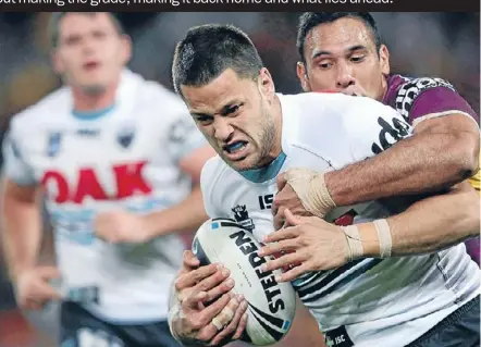  ?? Photo: CHRIS HYDE/ GETTY IMAGES ?? Breaking through: NRL rookie Matt Robinson gives his all against the Brisbane Broncos in the Panthers’ final game of 2012.